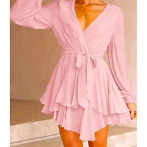 Pink layered dress bought but never worn.